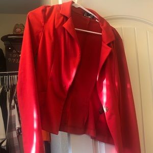 Woman’s red blazer